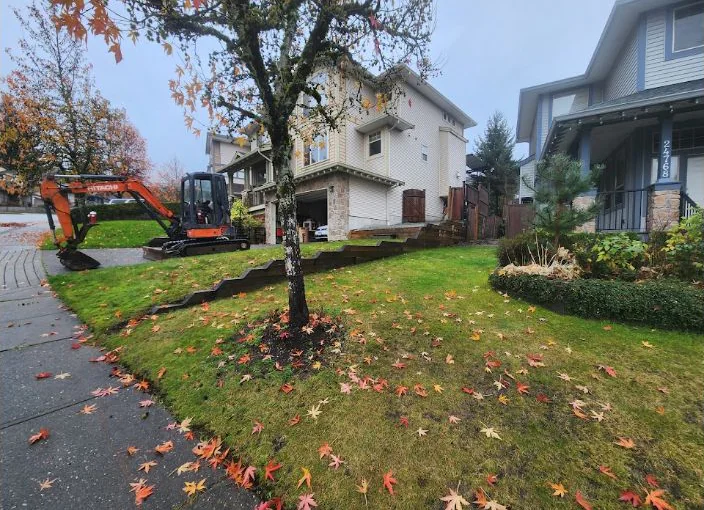 Failing wood retaining wall before replacement