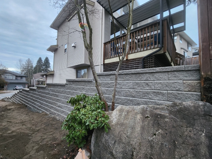 Completed segmental block retaining wall by New Wave Earthworks